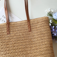 Close view of the Brown woven tote exterior