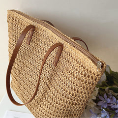 Angled view of the Brown woven tote bag