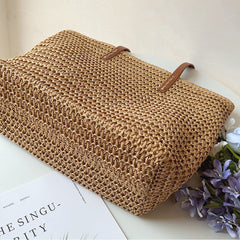 Base of the Brown woven tote bag