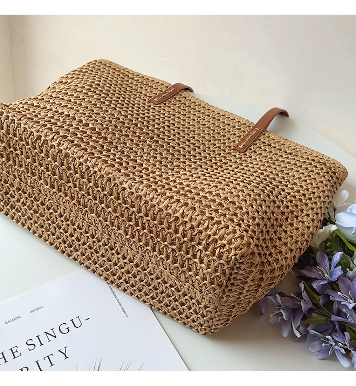 Base of the Brown woven tote bag