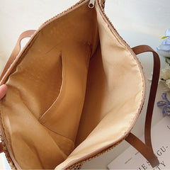 Lined interior of the Brown woven tote bag