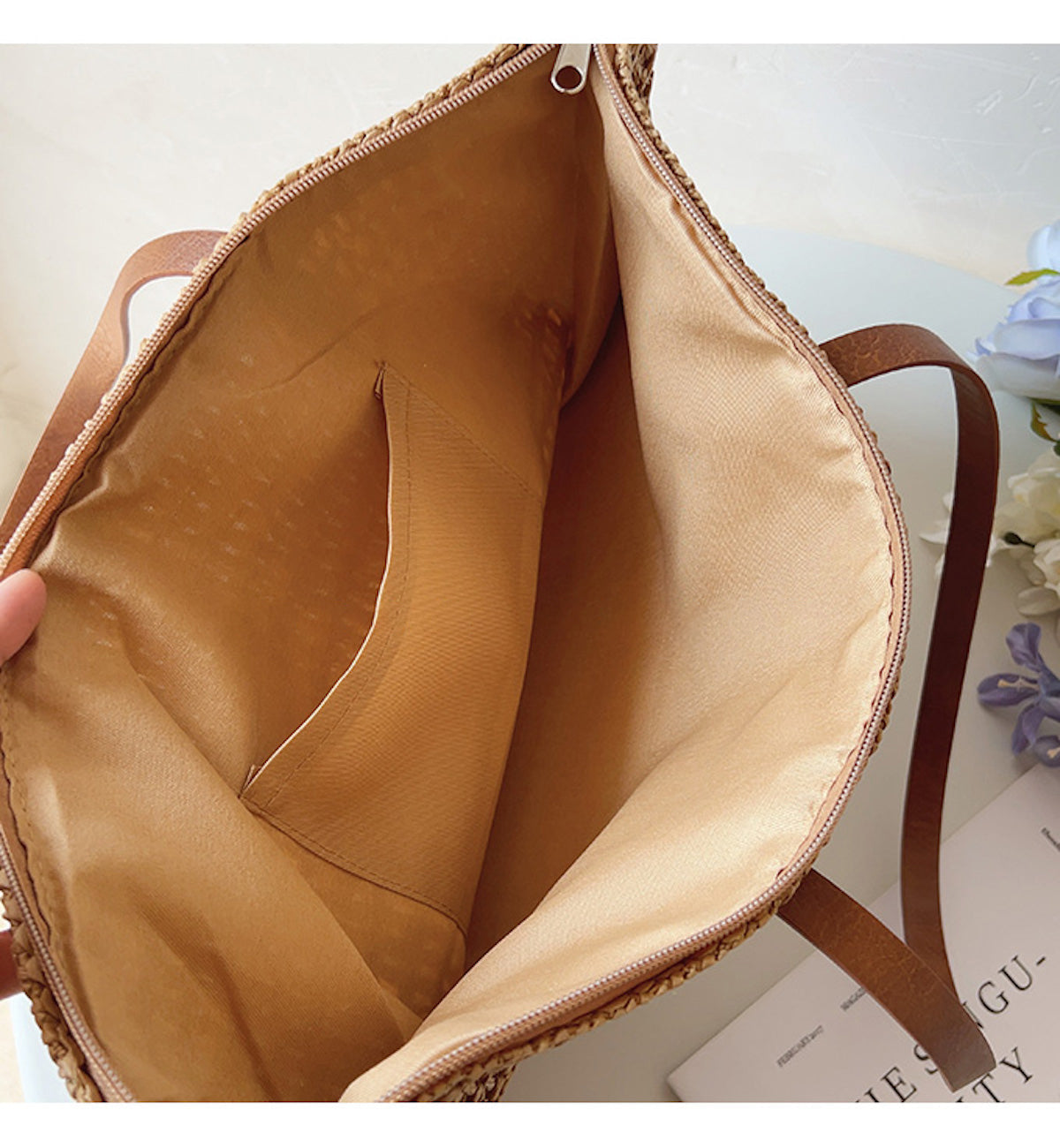 Lined interior of the Brown woven tote bag