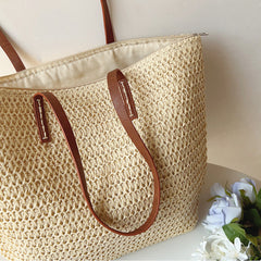 Angled view of the White woven tote bag