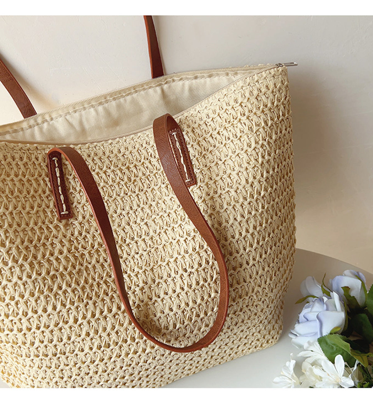 Angled view of the White woven tote bag