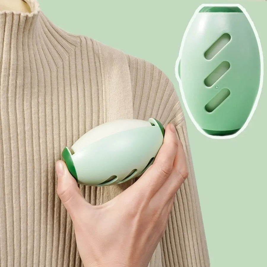 Green reusable lint remover used on a knit garment
