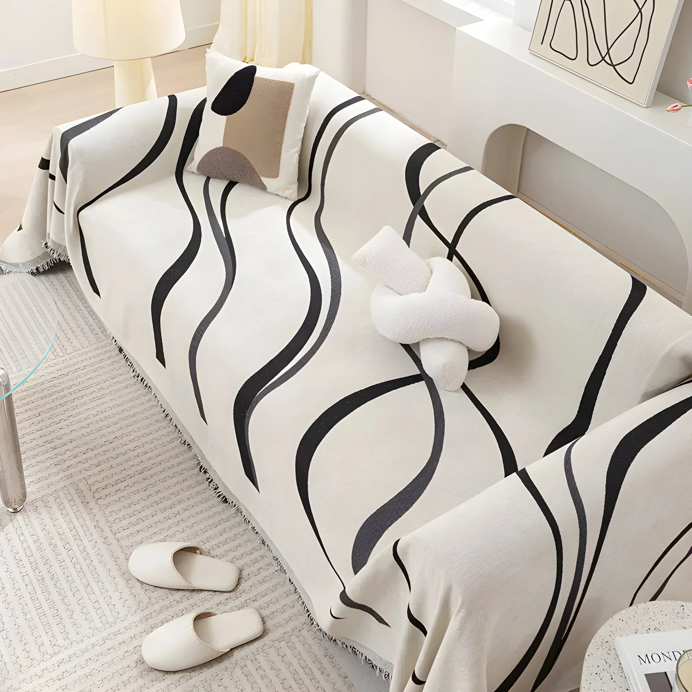 Reverse side of the Gray curved-line sofa throw