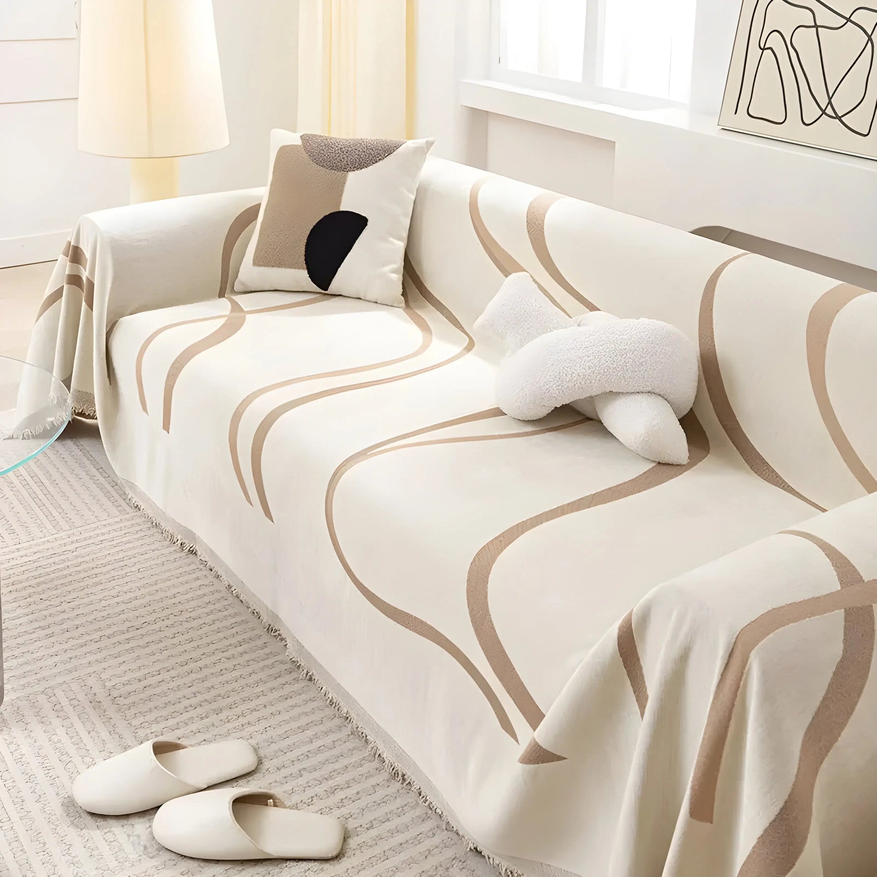 Khaki reversible chenille-cotton throw on a sofa