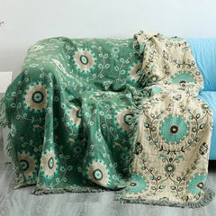 Light Green-Beige reversible patterned throw on a sofa