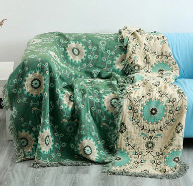 Light Green-Beige reversible patterned throw on a sofa