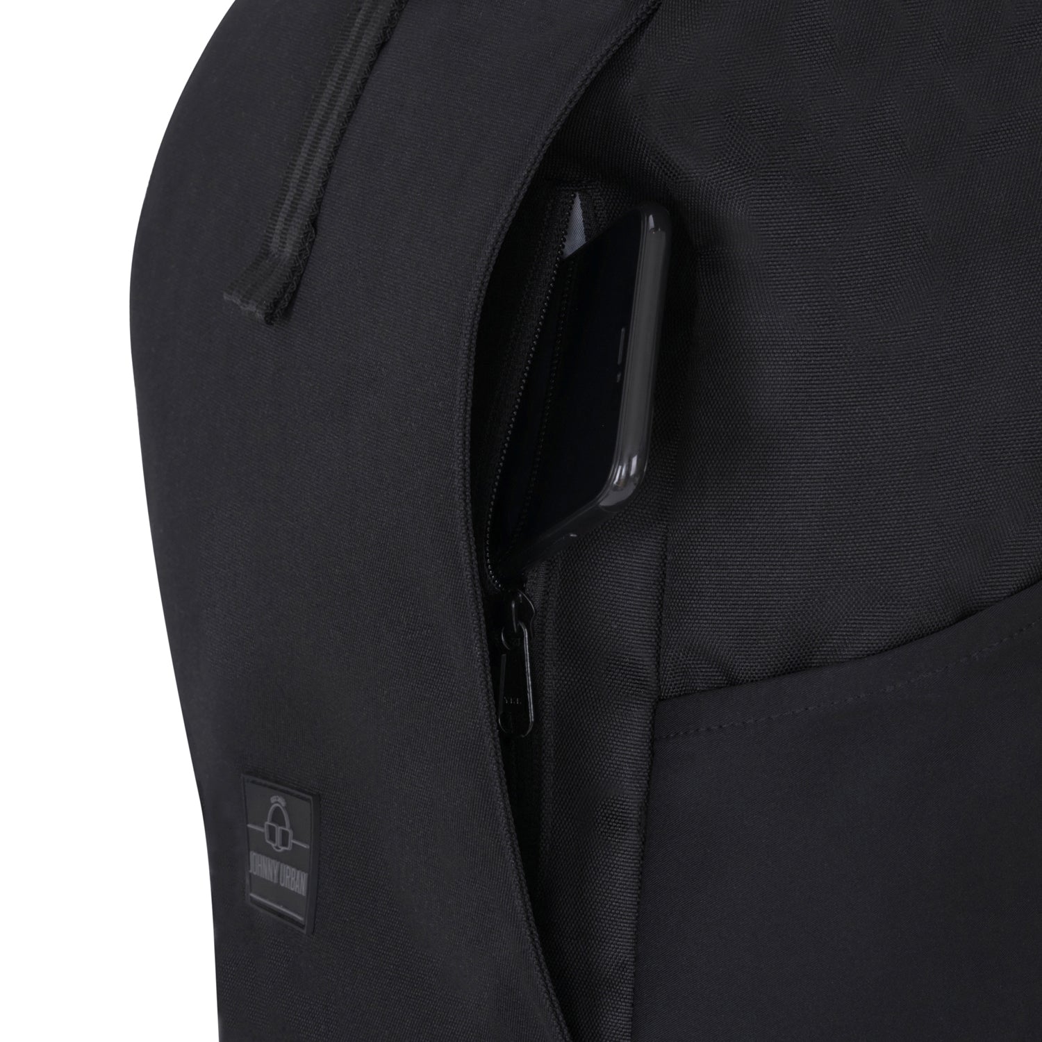 Side access zipper on the Black roll-top backpack