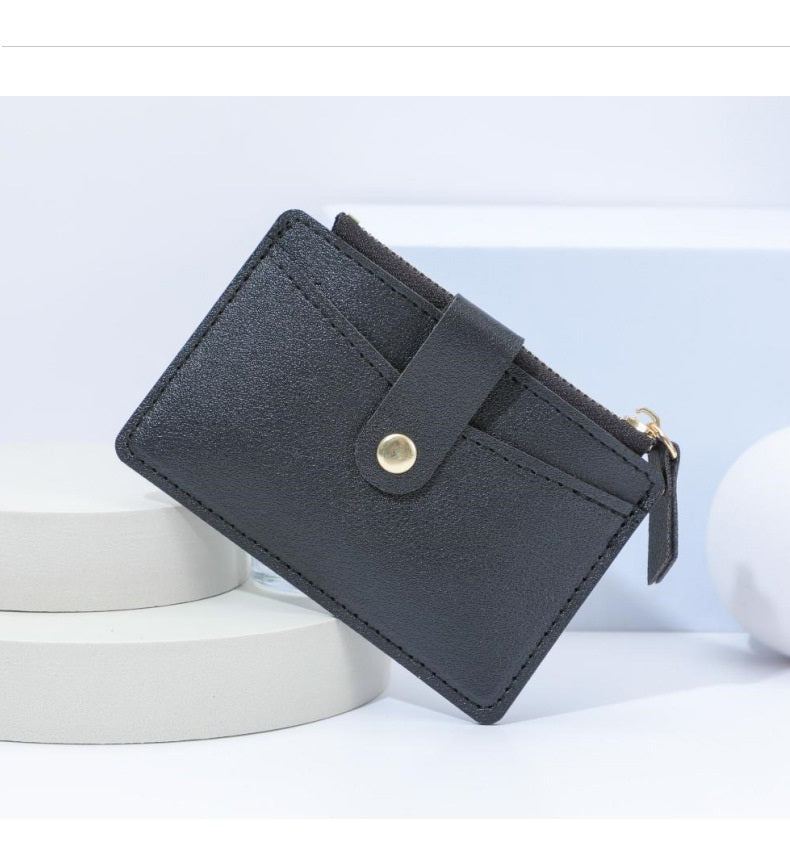 Black slim money-clip wallet with snap tab and side zipper