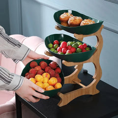 Green tiered fruit stand with fruit