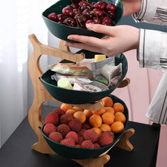 Green tiered fruit stand with removable bowls