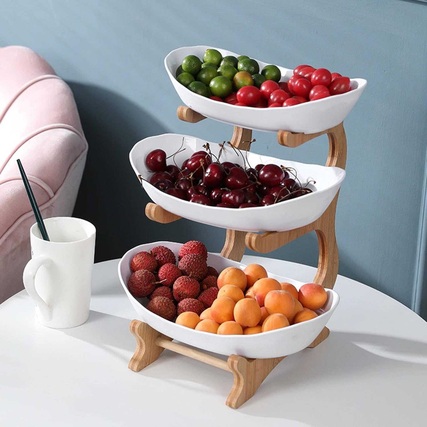 White tiered fruit stand with fruit