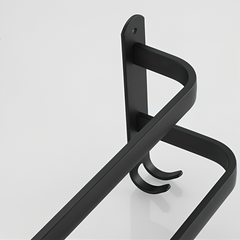 Close view of the integrated hooks on the towel rack