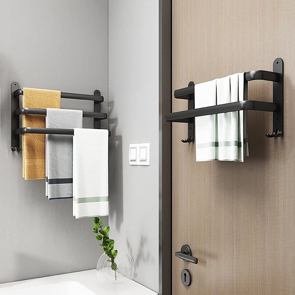 Towel racks mounted on bathroom walls