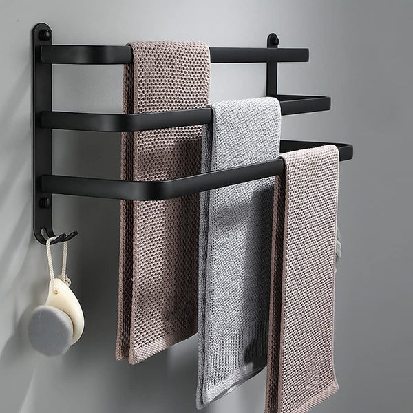 Three-bar wall-mounted towel rack with towels and end hooks