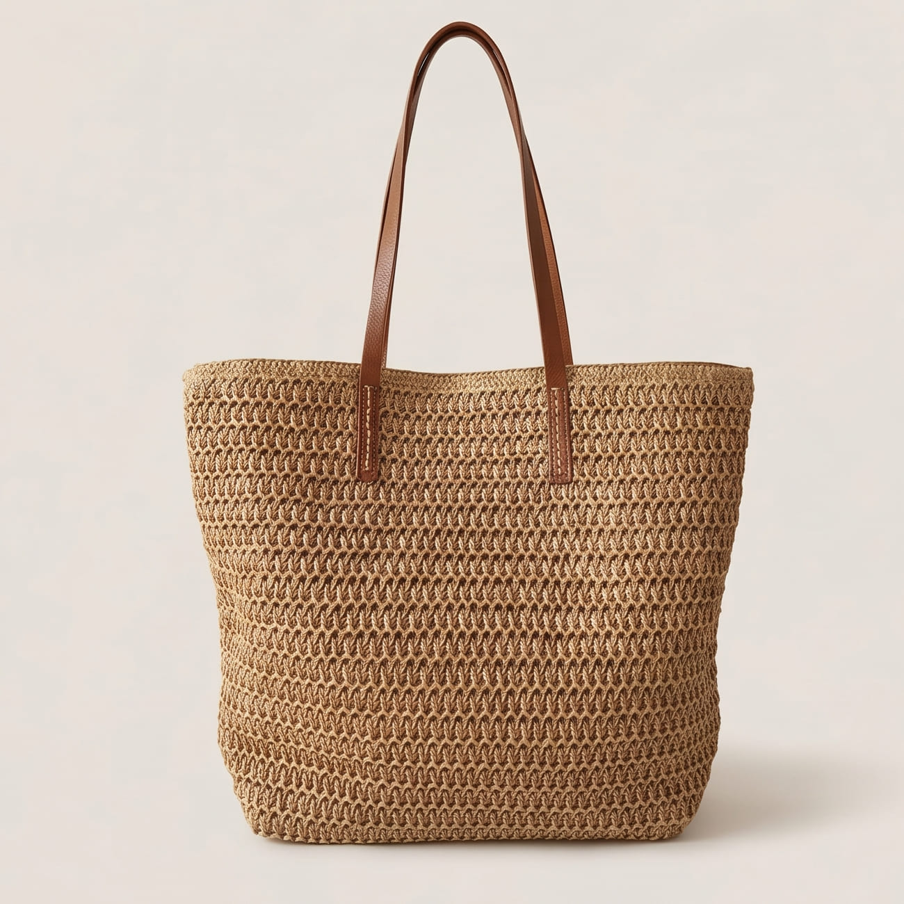Brown woven tote bag with long shoulder straps